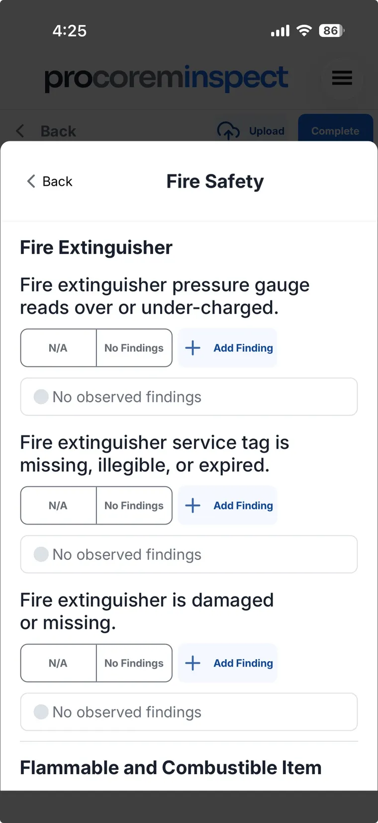 Procorem Inspect mobile app showing Fire Safety inspection standards for fire extinguishers, with N/A, No Findings, and Add Finding options on each standard